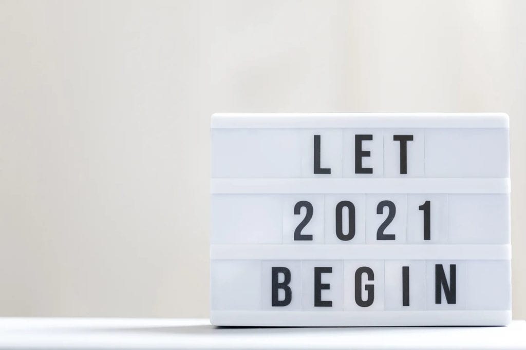 Sign reading "Let 2021 Begin"